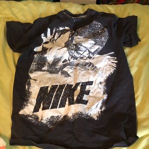 Black shirt with a football player